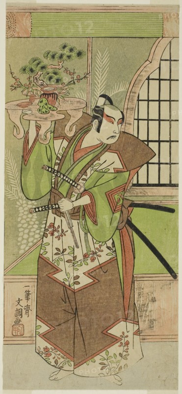The Actor Ichikawa Yaozo II in a pre-performance celebration of the play Soga Monogatari, performed at the Morita Theater in the second month, 1773, 1773, Ippitsusai Buncho, Japanese, active c. 1755-90, Japan, Color woodblock print, left sheet of hosoban triptych, 30.2 x 13.7 cm (11 7/8 x 5 3/8 in.)