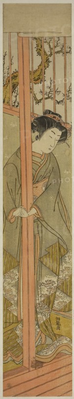 Young Woman Looking out from a Parlor, c. 1776, Isoda Koryusai, Japanese, 1735-1790, Japan, Color woodblock print, hashira-e, 26 1/8 x 4 5/8 in.