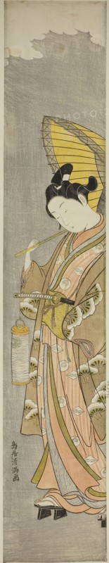 Young man holding umbrella and lantern, c. 1769, Torii Kiyomitsu I, Japanese, 1735-1785, Japan, Color woodblock print, hashira-e, 71.1 x 14.0 cm (28 x 5 1/2 in.)