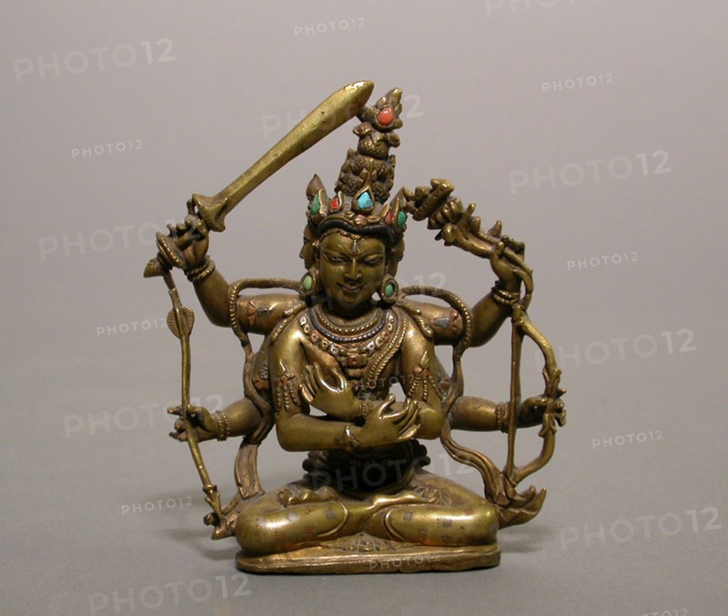Guhyasamaja Manjuvajra, an Esoteric Form of Bodhisattva Manjushri, Pala period, 12th century, India, Bengal or Bihar, Bihar, Brass with silver, copper, turquoise, and coral inlay, 8.6 × 7.1 × 2.5 cm (3 3/8 × 2 13/16 × 1 in.)