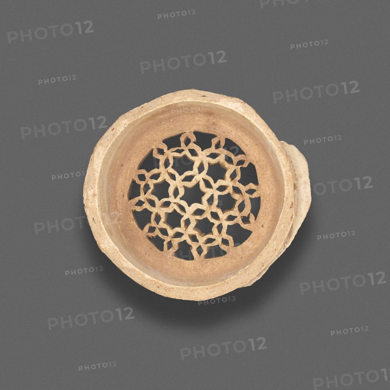 Clay filter with geometric design, Fatimid dynasty (969–1171), 11th–12th century, Egypt, Fustat, Masr al-`Atiqah, Earthenware, carved and punched, 875 × 6.4 cm (7/8 × 2 1/2 in.)