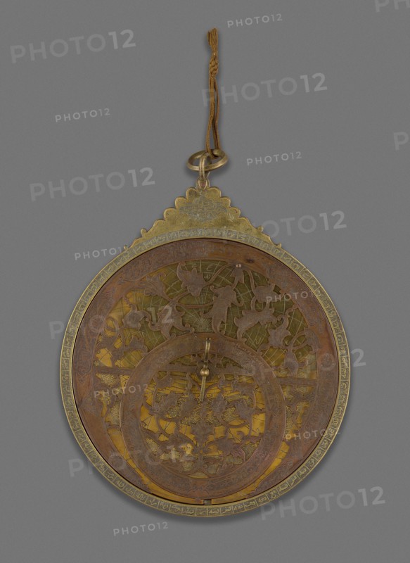 Astrolabe, Qajar dynasty (1796–1925), 18th century, with later additions, Iran, Isfahan, Iran, Brass with pierced and engraved decoration, 25.2 × 18.5 × 3 cm (9 15/16 × 7 1/4 × 1 3/16 in.)