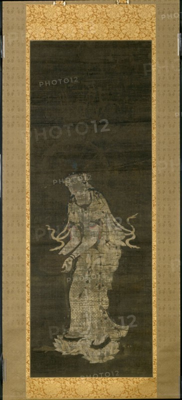 The Bodhisattva Kannon, from the triptych Approach of the Amida Trinity, Kamakura Period, mid–13th century, Japanese, Japan, Hanging scroll, ink, colors, and cut gold on silk, 138 x 50 cm (54 3/8 x 19 3/4 in.), 245 x 79 cm (with mount)