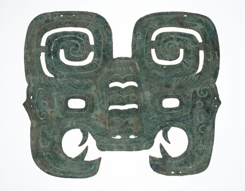 Mask, Western Zhou dynasty ( 1046–771 BC ), about 9th century BC, China, Reportedly found in Shaanxi province, China, Bronze, 26.4 × 32.2 × 0.3 cm (10 1/2 × 12 7/8 × 3/32 in.)