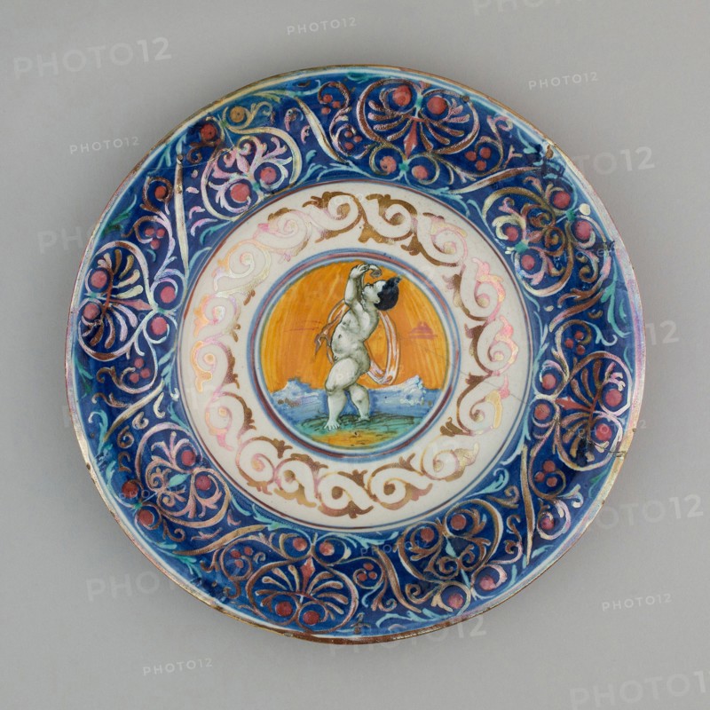 Plate with Cupid, 1530/40, Italian, Gubbio, Attributed to workshop of Giorgio Andreoli, Gubbio, Tin-glazed earthenware (maiolica), Diameter: 23.5 cm (9 1/4 in.)