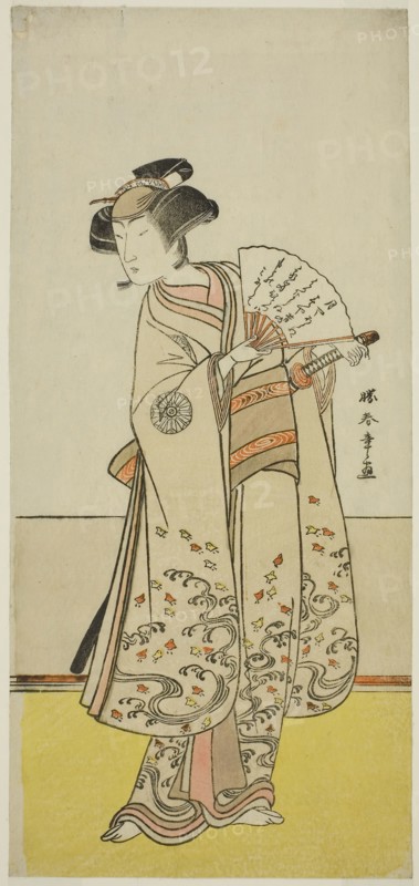 The Actor Nakamura Noshio I as Oiso no Tora (?) in the Play Shida Yuzuriha Horai Soga (?), Performed at the Morita Theater (?) in the First Month, 1775 (?), c. 1775, Katsukawa Shunsho ?? ??, Japanese, 1726-1792, Japan, Color woodblock print, hosoban, 32.4 x 14.8 cm (12 3/4 x 5 13/16 in.)