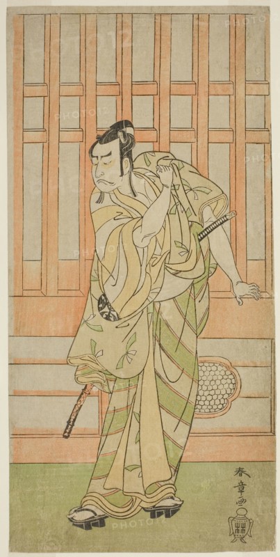 The Actor Nakamura Nakazo I as Kudo Saemon Suketsune (?) in the Play Sakai-cho Soga Nendaiki (?), Performed at the Nakamura Theater (?) in the First Month, 1771 (?), c. 1771, Katsukawa Shunsho ?? ??, Japanese, 1726-1792, Japan, Color woodblock print, hosoban, from a multisheet composition, 30.1 x 14.6 cm (11 7/8 x 5 3/4 in.)
