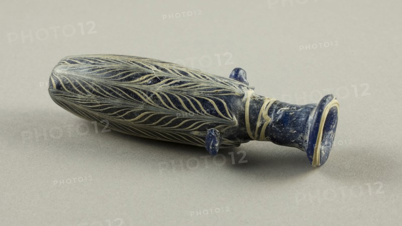 Bottle, Hellenistic, 2nd/1st century BC, Eastern Mediterranean, Egypt, Glass, core-formed technique, 12.1 × 4.1 × 3.2 cm (4 3/4 × 1 5/8 × 1 1/4 in.)