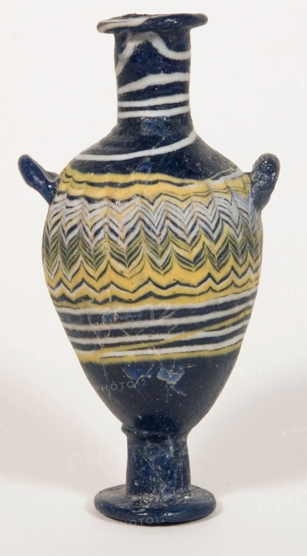 Bottle, early 3rd/early 2nd century BC, Eastern Mediterranean or Italian, Eastern Mediterranean Region, Glass, core-formed technique, 10.5 × 5.4 × 4.3 cm (4 1/8 × 2 1/8 × 1 11/16 in.)