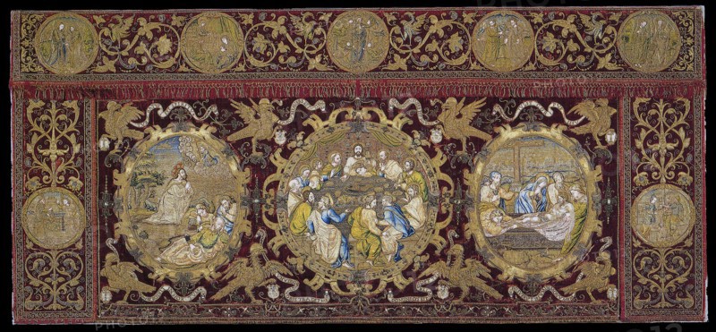 Altar Frontal Depicting Scenes from the Life of Christ, 1575/1600, Spain, Seo de Urgel, Silk, warp-float faced broken warp chevron twill weave with supplementary pile warps forming cut solid velvet, appliquéd with linen, plain weave, silk and gilt and silvered wire, plain weave with twill interlacing of secondary binding warps and patterning wefts, silk and silvered wire, twill weave, embroidered with silk, gilt- and silvered-metal-strip-wrapped silk and gilt and silvered wire in overcast, satin, padded satin, split, and stem stitches, laid work, couching, and padded couching, semi-precious stones, edged with woven fringes, 106.7 x 236 cm (42 x 92 7/8 in.)