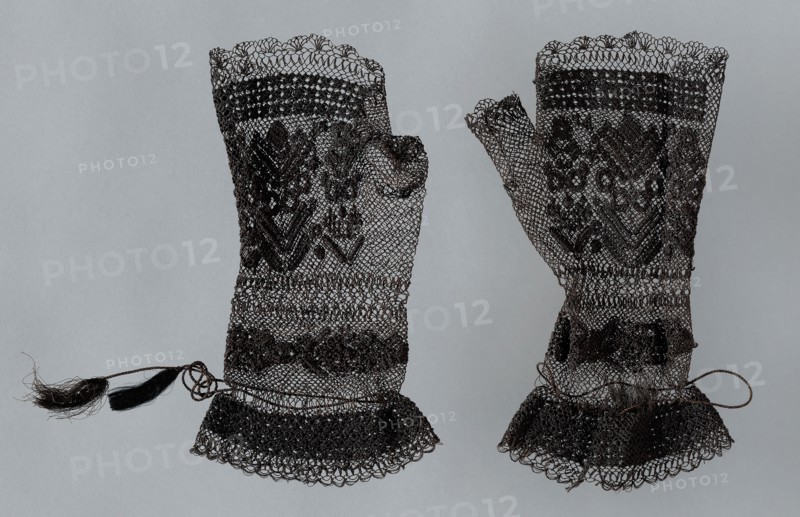 Pair of Mittens, c. 1850, England or France, England, Silk, bands of bunch, spider, and square netting, embroidered in cloth and overcast stitches, cotton cords with silk cut tassels, a: 18.8 × 11.4 cm (7 3/8 × 4 1/2 in.)