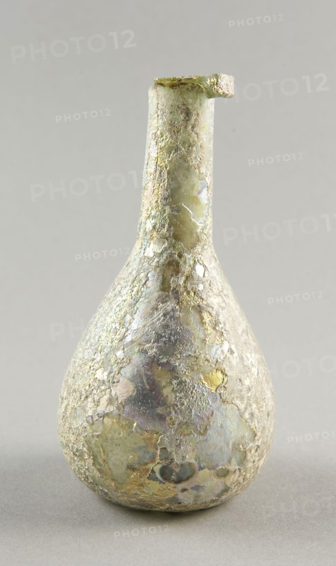 Bottle, 1st/3rd century AD, Ancient Mediterranean, Mediterranean Region, Glass, blown technique, 12.1 × 6.4 × 6.4 cm (4 3/4 × 2 1/2 × 2 1/2 in.)