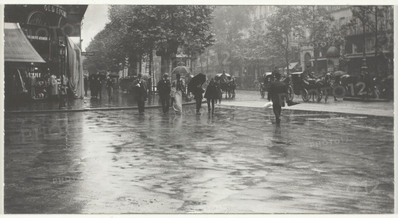A Wet Day on the Boulevard, Paris, 1894, printed 1918/32, Alfred Stieglitz, American, 1864–1946, United States, Gelatin silver print, 5.6 x 10.4 cm (image/paper/first mount), 33.5 x 26.3 cm (second mount)