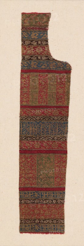 Fragment, 15th century, Andalucia, Spain, Andalucia, Silk and gilt-metal-strip-wrapped silk, satin weave with secondary binding warps and supplementary patterning wefts, 45.5 × 10.3 cm (17 7/8 × 4 1/8 in.)