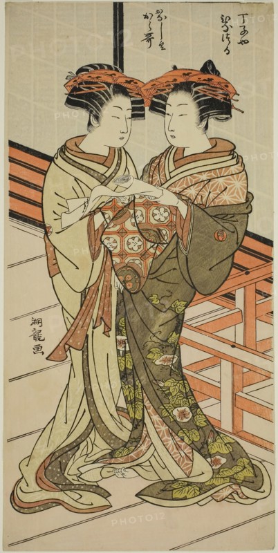 The Courtesans Hinazuru and Karauta of the Chojiya Holding a Letter, c. 1776/81, Isoda Koryusai, Japanese, 1735-1790, Japan, Color woodblock print, hosoban, 13 3/4 x 6 3/4 in.