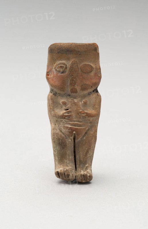 Mold-Made Female Figurine, c. A.D. 100/600, Possibly Moche, Possibly north coast, Peru, Peru, Ceramic and pigment, 7.9 x 2.2 cm (3 1/8 x 1 1/4 in.)