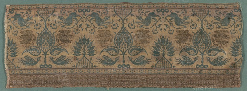 Fragment, 14th century, Italy, Silk, gilt-animal-substrate-wrapped linen, warp-float faced 2:1 'S' twill weave with supplementary patterning weft and brocading wefts tied by secondary binding warps in plain and twill interlacings, 20.5 x 57.4 cm (8 1/8 x 22 5/8 in.)