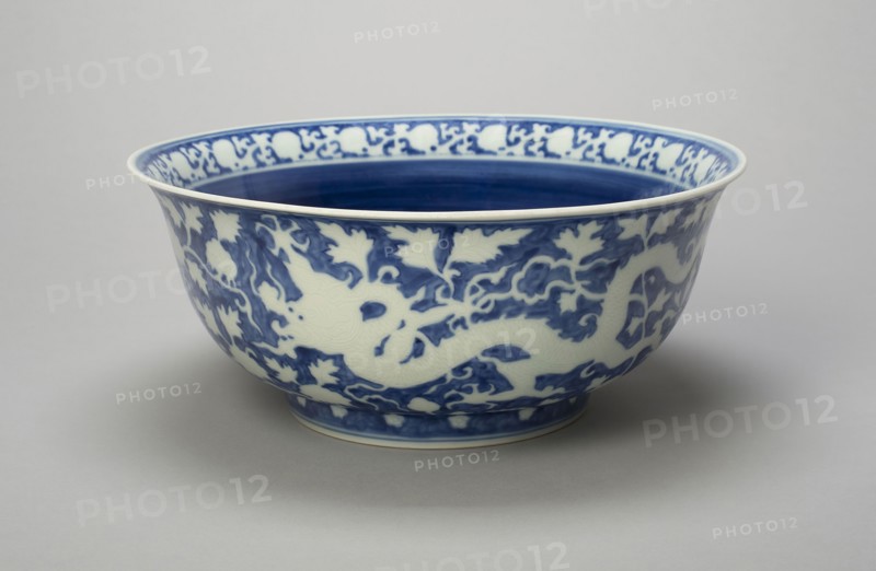 Bowl with Dragons, Peony Scrolls, and Band of Lingzhi Mushrooms, Ming dynasty (1368–1644), Jiajing reign mark and period (1522–1566), China, Porcelain painted in underglaze blue with design in reserve, H. 11.8 cm (4 5/8 in.), diam. 28.5 cm (11 1/4 in.)