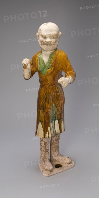 Groom, Tang dynasty (618–907 A.D.), first half of 8th century, China, Earthenware with three-color (sancai) lead glazes and traces of pigments, 59.5 × 18.8 × 20.5 cm (23 7/16 × 7 3/8 × 8 1/16 in.)