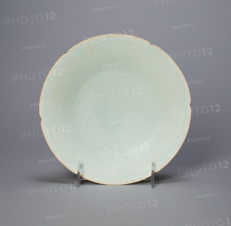 Foliate Bowl with Fish and Waves, Northern Song dynasty (960–1127), 12th century, China, Qingbai ware, porcelain with underglaze incised decoration, H. 5.5 cm (2 3/16 in.), diam. 19.6 cm (7 3/4 in.)