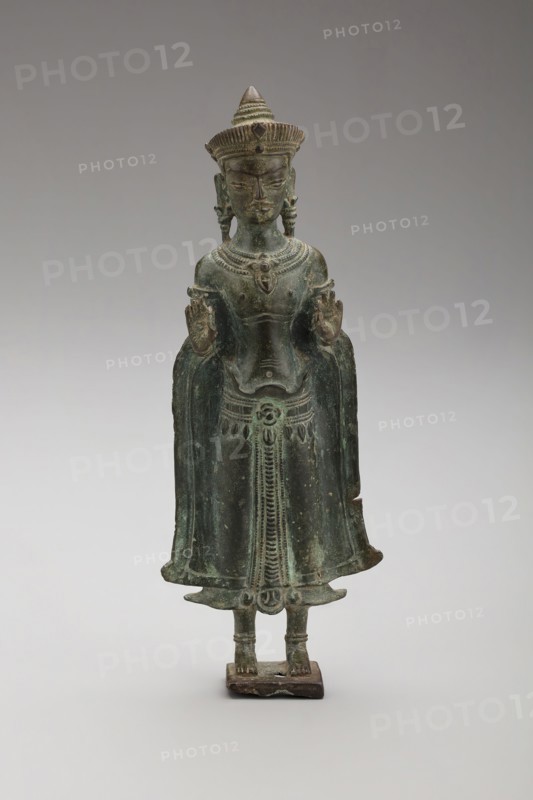 Crowned Buddha with Hands in Gesture of Teaching (Vitarkamudra), Angkor period, late 12th/early 13th century, Thailand (northeastern), Thailand, Bronze, 15.7 x 5.8 x 2.3 cm (6 1/8 x 2 1/4 x 7/8 in.)