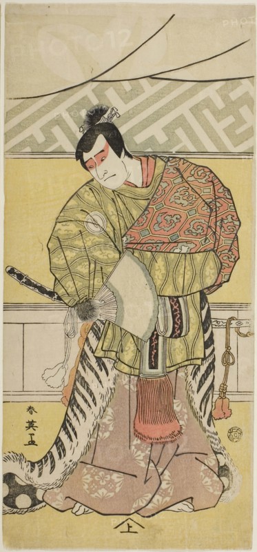 The Actor Sakata Hangoro III as Takechi Mitsuhide in The Banquet, the Final Act in Part One of the Play Kanagaki Muromachi Bundan (Muromachi Chronicle in Kana Script), Performed at the Ichimura Theater from the First Day of the Eighth Month, 1791, c. 1791, Katsukawa Shun’ei, Japanese, 1762-1819, Japan, Color woodblock print, center sheet of hosoban triptych (right: 1939.2216, left: 1980.276b), 32 x 14.6 cm (12 5/8 x 5 3/4 in.)