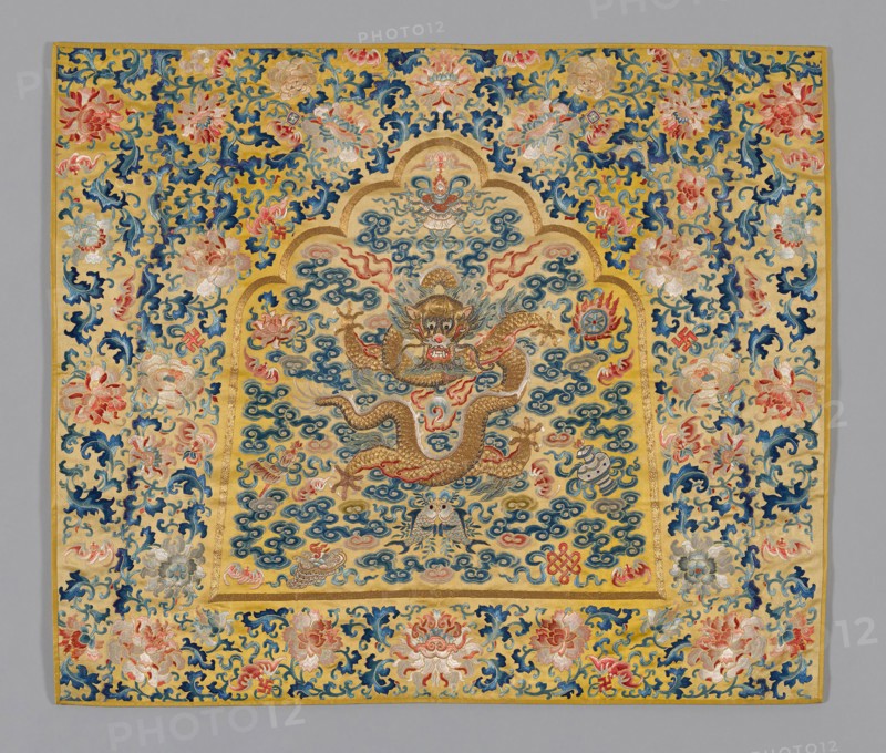 Panel (Furnishing Fabric), Qing dynasty(1644–1911), 1860/80, China, Golden yellow silk embroidered with a dragon in gold thread surrounded by clouds in the center, surrounded further by a border of chyrsanthemums and foliage in shades of cobalt blue and terracotta, 63.2 × 74.2 cm (24 7/8 × 29 1/4 in.)