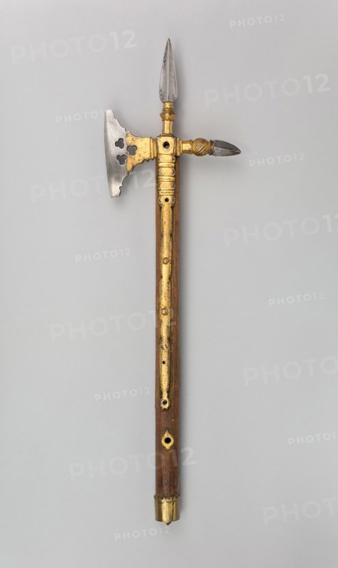 Horseman’s Axe, early 16th century, Spanish or Flemish, Probably, Spain, Steel with gilding, brass, iron, wood (oak), and attached tassel, L. 64.8 cm (25 1/2 in.)