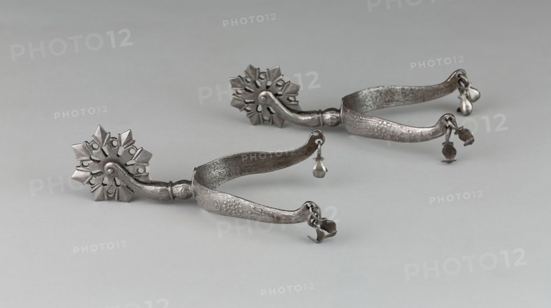 Pair of Rowel Spurs, early 17th century, North European, Northern Europe, Iron and silver, L. 16.5 cm (6 1/2 in.), W. 8.9 cm (3 1/2 in.)