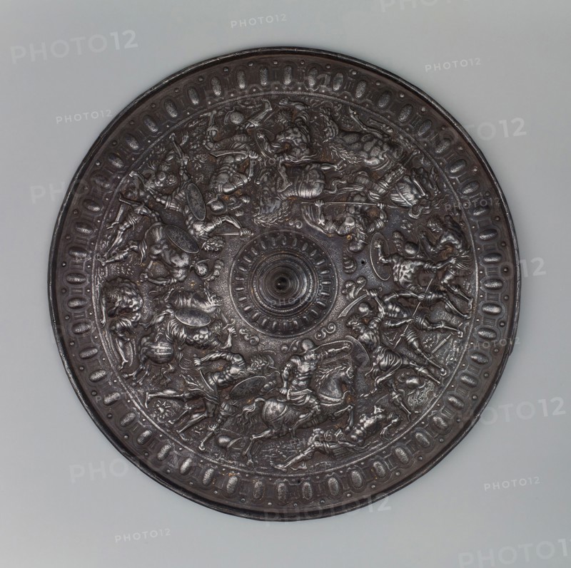 Parade Shield of Henry II, King of France (reigned 1547-1559), copy of, 1909 (copy of c. 1555 style), Simoni of Geneva, Switzerland, Geneva, active c. 1910, Geneva, Iron, traces of gilding, Diam. 55.9 cm (22 in.)