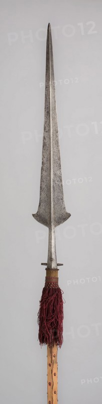 Partisan, c. 1520, Italian, Italy, Steel, wood (pine), iron, velvet, and tassel, Blade with socket L. 91.8 cm (36 1/8 in.)