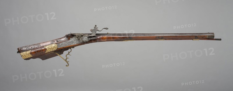 Wheellock Rifle, c. 1725, Johann Casper Rudolph, Austrian, active 1705—1720, Vienna, Walnut, gold, brass, iron, and horn, L. 115.3 cm (45 3/8 in.)