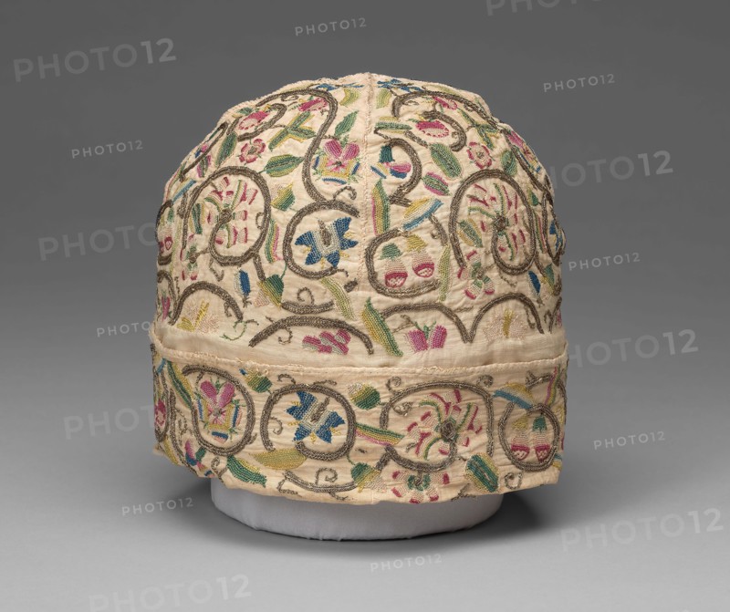 Man’s Cap, 1601/25, England, Linen, plain weave, embroidered with silk floss and gilt-metal-strip-wrapped silk, in variety of buttonhole, chain, long-armed cross, ladder, outline, and running stitches, woven wheels, 15.9 × 19.6 × 19.6 cm (6 3/8 × 7 3/4 × 7 3/4 in.)