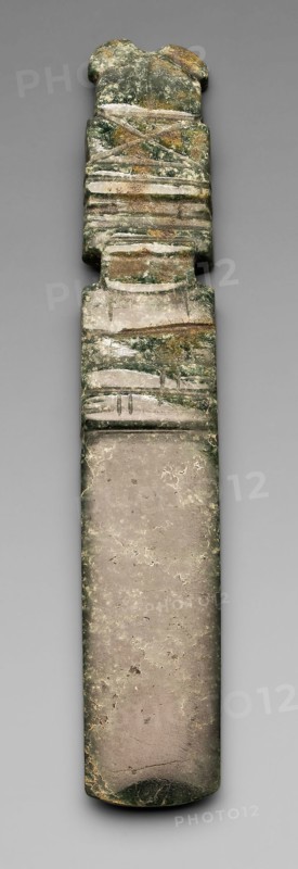 Celt Pendant Depicting an Abstract Figure with a Tall Headdress, A.D. 1/500, Nicoya, Nicoya, Guanacaste province, Costa Rica, Nicoya, Jade, H. 14.6 cm (5 3/4 in.)