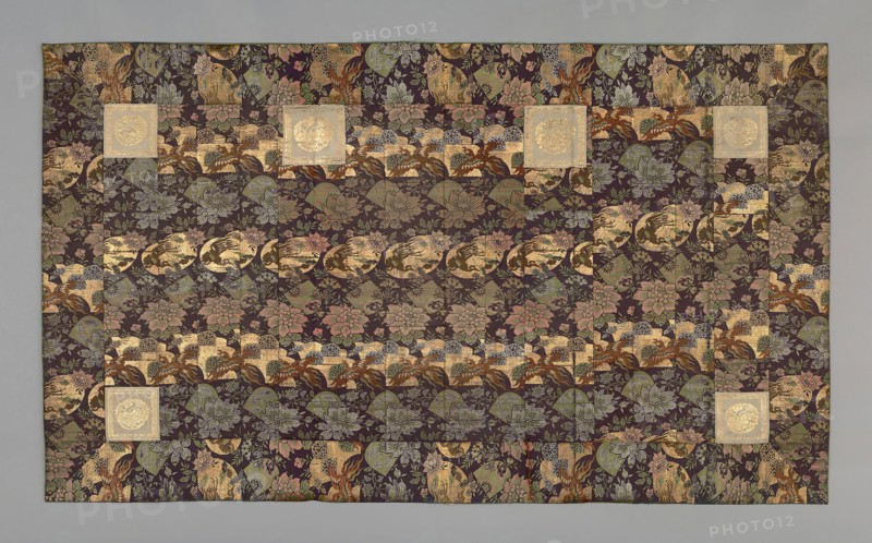 Kesa, late Edo period (1789–1868), mid–19th century, Japan, Silk and gold-leaf-over-lacquered-paper strip, warp-float faced 3:1 'Z' twill weave with weft-float faced 1:3 'Z' twill interlacings of secondary binding warps and supplementary patterning wefts, lined with silk, plain weave, 118.2 x 202 cm (46 1/2 x 79 1/2 in.)