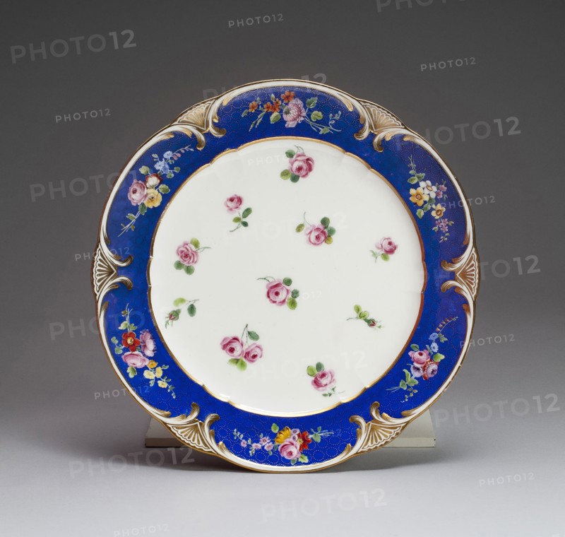 Plate, 1771, Sèvres Porcelain Manufactory, French, founded 1740, Sèvres, Soft-paste porcelain, dark blue ground, polychrome enamels, and gilding, Diam. 24.8 cm (9 3/4 in.)