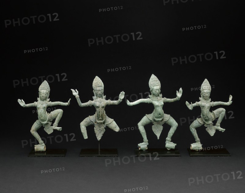 Group of Four Celestial Dancing Beauties (Apsaras), Angkor period, late 12th/early 13th century, Cambodia, Cambodia, Bronze, 1: 16.5 × 12 × 5.3 cm (6 1/2 × 4 3/4 × 2 1/8 in.), 2: 15.5 × 10.6 × 4.4 cm (6 1/8 × 4 1/8 × 1 3/4 in.), 3: 13.8 × 11.5 × 3.4 cm (5 3/8 × 4 1/2 × 1 3/8 in.), 4: 15.2 × 11 × 3.5 cm (6 × 4 3/8 × 1 3/8 in.)