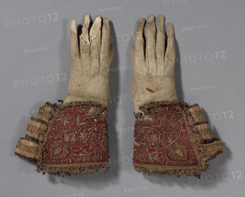 Pair of Men’s Gloves, 1600/50, England, Gloves: leather, Gauntlets: silk, satin weave, embroidered with linen, gilt-metal-coiled wire and strips, and gilt-metal-strip-wrapped silk in couching and padded couching, ribbons of silk, plain weave, edged with gilt-metal-strip-wrapped silk, bobbin straight lace, metal spangles, a: 35.5 × 19.2 cm (14 × 7 1/2 in.)