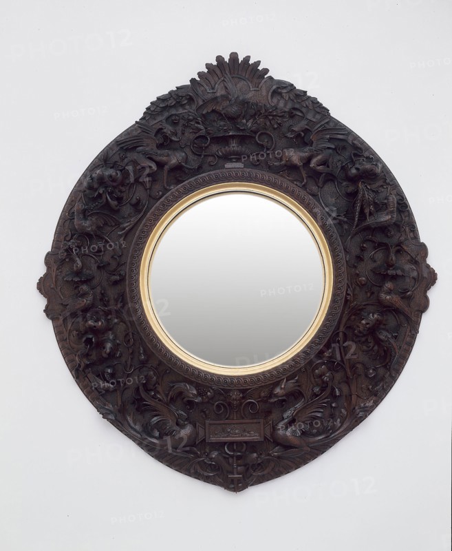 Mirror, 1870, Siena, Italy, Carlo Bartolozzi (Italian, 1835-1922) and Nicodemo Ferri (Italian, c. 1835-1899), Siena, Walnut, glass, and gilding, 45.7 × 41.5 cm (18 × 16 3/8 in.)