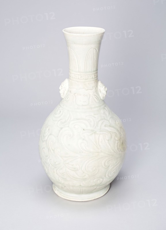 Vase with Ox Masks and Upright and Curling Leaves, Southern Song dynasty (1127–1279), China, Qingbai ware, glazed porcelain with underglaze carved and molded decoration, H. 32.0 cm (12 5/8 in.), diam. 15.3 cm (6 in.)