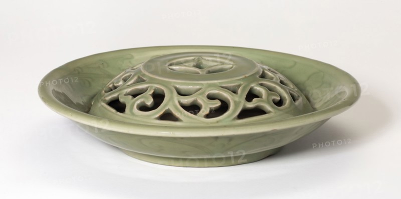 Dish with Openwork Dome and Floral Scrolls, Ming dynasty (1368–1664), 15th century, China, Longquan ware, celadon-glazed stoneware with underglaze incised decoration, H. 5.8 cm (2 1/4 in.), diam. 23.3 cm (9 3/16 in.)