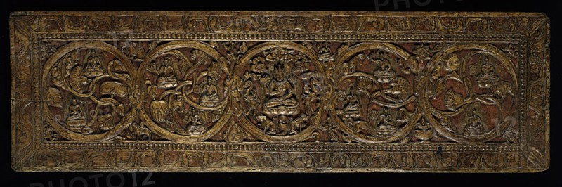 Book Cover for a Manuscript of the Perfection of Wisdom (Ashtashasrika Prajnaparamita) Sutra, 14th century, Tibet, South Central Tibet, Tibet, Wood with traces of red pigment and gilding, 68 x 20 x 2.1 cm (26 3/4 x 7 7/8 x 7/8 in.)
