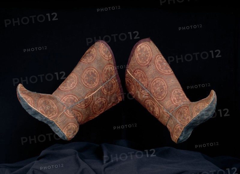 Pair of Woman’s Boots with Tying Ribbon, Tang dynasty(618–906)/ Song dynasty(960–1279), 10th/11th century, China, Outer boot: silk, complementary weft twill weave with inner warps, seam trim cord: silk, oblique interlacing, ribbon and top boot edge binding: silk, simple and complex gauze weave, lined with silk, plain weave, lining’s upper edge facing: silk, twill damask weave, sole: silk, plain weave, tying ribbon: twill weave self-patterned by areas of twill weave, a: 40 × 29.2 cm (15 3/4 × 11 1/2 in.)
