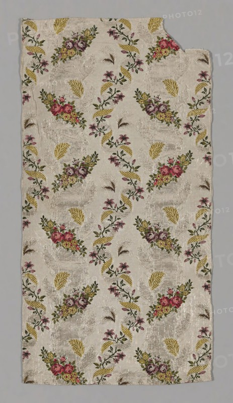 Panel from a Skirt, c. 1753/55, England, Spitalfields, Spitalfields, Silk, gilt-and-silvered-metal strip, and gilt-metal-strip-wrapped silk, plain weave with patterning and brocading wefts, 100.2 x 52 cm (39 3/8 x 20 1/2 in.)
