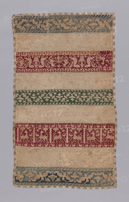 Towel, 16th century, Italy, Five bands of linen, plain weave, pulled thread work with silk in Italian cross stitches and embroidered with silk in back stitches, alternating with four bands of linen, knotted square netting, embroidered with linen in darning stitches, edged with silk and linen, plain weave with extended ground weft fringe, 108.2 x 63.8 cm (42 5/8 x 25 1/8 in.)