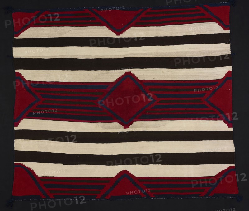 Chief Blanket (Third Phase), c. 1860/65, Navajo (Diné), Northern New Mexico or Arizona, United States, Southwest, Wool, single interlocking tapestry weave, twined edges, corner tassels, 149.6 x 173.9 cm (58 7/8 x 68 1/2 in.)