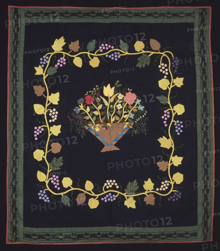Bedcover (Basket of Flowers Quilt), c.  1860, Made for the Bridges Family, United States, Kentucky, Lexington, Kentucky, Silk, plain weave, appliquéd with silk plain weaves and silk and cotton, plain weaves cut solid velvet, sewn with silk and cotton, and embroidered with silk in chain, herringbone, satin, single back and stem stitches, French knots and couching, edged with silk, plain weave, backed with cotton, plain weave, glazed, 149.8 x 131.2 cm (59 x 51 5/8 in.)