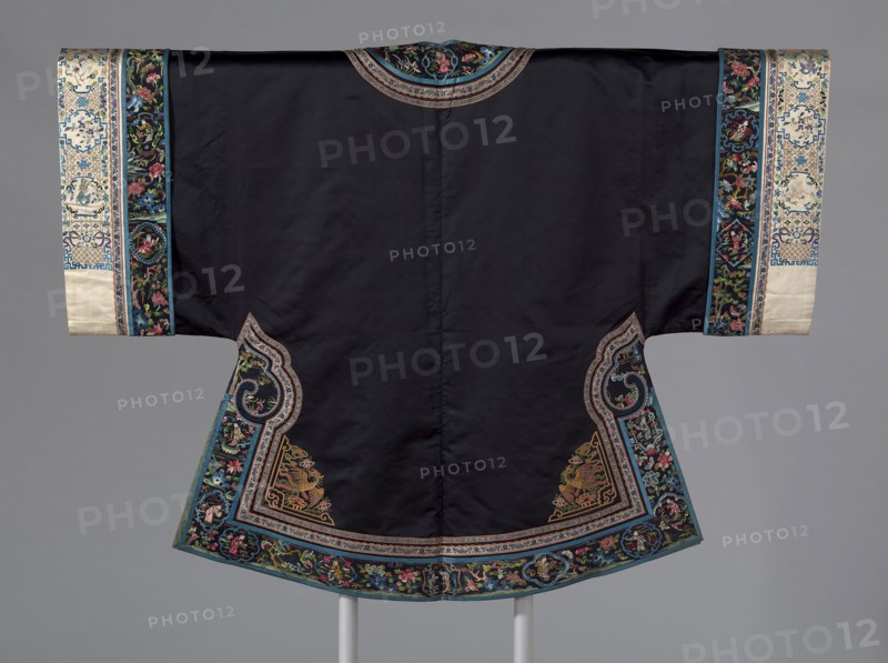 Woman’s Surcoat, Qing dynasty (1644–1911), 1860/90, Han-Chinese, China, Body: silk, warp-float faced 7:1 satin weave, embroidered with silk and gold-leaf-over-lacquered-paper-strip-wrapped wild silk in laid work and couching, neck, front, hem, sides and sleeves: silk, warp-float faced 7:1 satin weave, embroidered with silk and gold-leaf-over-lacquered-paper-strip-wrapped silk wrapped cotton in knot, satin and stem stitches, laid work and couching, edged with silk, warp-float faced 7:1 satin weave, sleeve bands: silk, warp-float faced 7:1 satin weave, embroidered with silk and gold-leaf-over-lacquered-paper-strip-wrapped silk in knot, satin and stem stitches, laid work and couching, three ribbons: silk and gold-leaf-over-lacquered-paper-strip-wrapped cotton, plain weave self-patterned by main warp floats (narrowest has gold-leaf-over-lacquered-strip-wrapped silk), lined with silk, plain weave, 97.5 × 130.2 cm (38 3/8 × 51 1/4 in.)