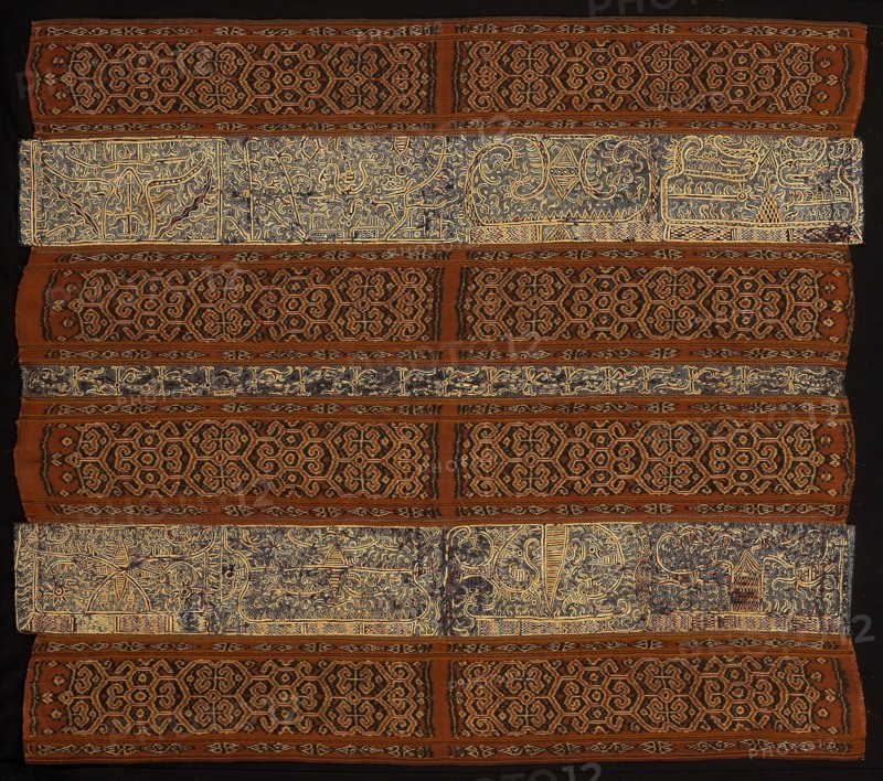 Woman’s Ceremonial Skirt (tapis), 18th century (?), Paminggir people, Indonesia, South Sumatra, Lampung area, Indonesia, Five panels joined: three panels of stripes of silk and cotton, warp resist dyed (warp ikat) plain weave (paired warps), stripes of warp-faced, weft ribbed plain weave with supplementary brocading wefts and one stripe of cotton, plain weave, embroidered with silk in back, double running, stem and surface satin stitches and two panels of cotton, plain weave, embroidered with silk in back, stem and surface satin stitches, 138.6 x 121.8 cm (54 1/2 x 47 7/8 in.)