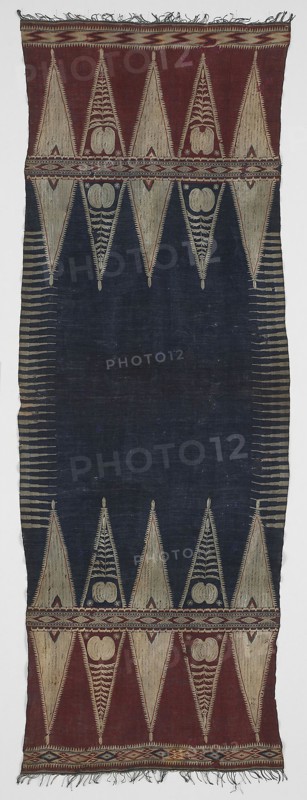 Shoulder Cloth (?), End of the 19th century, Komering (?), Indonesia, South Sumatra, Lampung area, Indonesia, Cotton, bands of plain weave, of plain weave embroidered with cotton in chain, double running, eyelet hole and satin stitches, of plain weave with supplementary patterning and brocading wefts, of single interlocking tapestry weave, of weft twining, of weft resist dyed (weft ikat) plain weave, plied knotted warp fringe, 183 x 63.5 cm (72 x 25 in.)